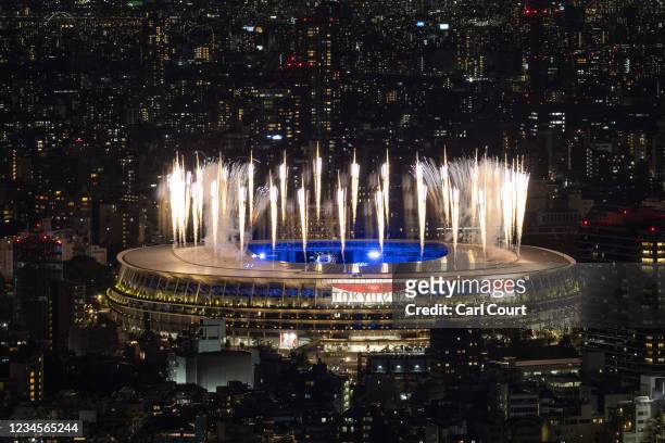 Fireworks are displayed over the Olympic Stadium during the closing ceremony of the Tokyo Olympics on August 8, 2021 in Tokyo, Japan.