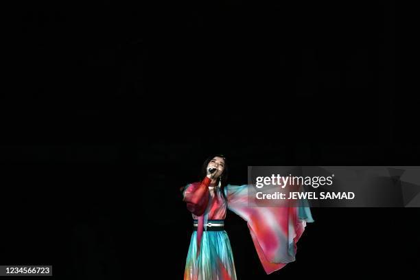 Japanese singer Milet performs during the closing ceremony of the Tokyo 2020 Olympic Games, at the Olympic Stadium, in Tokyo, on August 8, 2021.