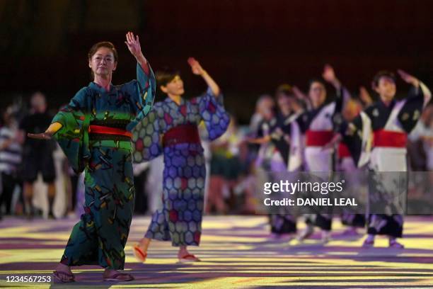 Dancers perform during the closing ceremony of the Tokyo 2020 Olympic Games, at the Olympic Stadium, in Tokyo, on August 8, 2021.