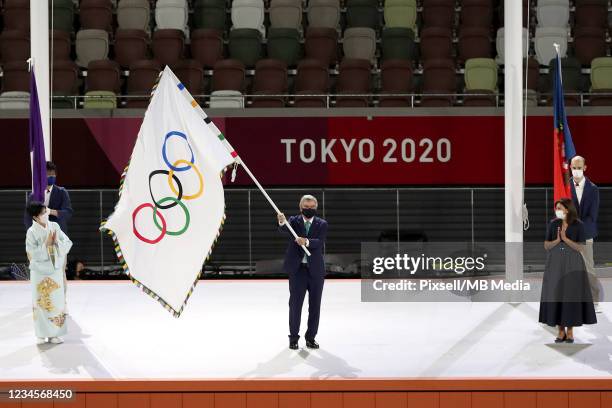 Mayor of Paris Anne Hidalgo waits to receive The Olympic flag in honor of passing the 2024 games to Paris during the Tokyo 2020 Olympic Games closing...