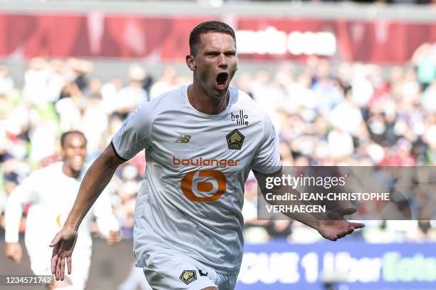 Lille's Dutch defender Sven Botman celebrates after scoring his team's first goal during the French L1 football match between FC Metz and Lille OSC...