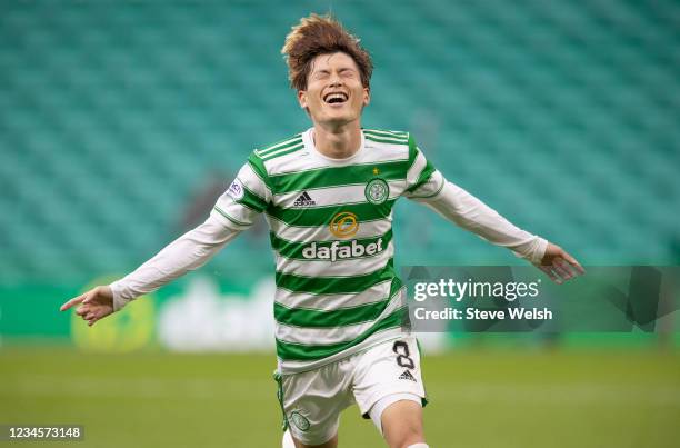 Kyogo Furuhashi of Celtic celebrates his third goal during the Cinch Scottish Premiership match between Celtic FC and Dundee FC on August 8, 2021 in...