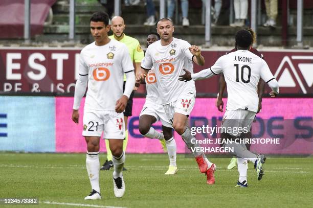 Lille's French midfielder Jonathan Ikone celebrates after scoring his team's second goal during the French L1 football match between FC Metz and...