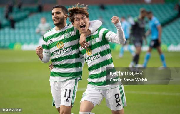 Kyogo Furuhashi of Celtic celebrates his 3rd Celtic goal with teammate Liel Abada during the Cinch Scottish Premiership match between Celtic FC and...