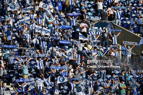 Porto fans shows his support during the Liga Bwin match between FC Porto and Belenenses Sad at Estadio do Dragao on August 8, 2021 in Porto, Portugal.