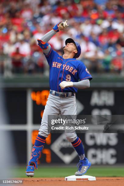 Brandon Nimmo of the New York Mets gestures after hitting a double against the Philadelphia Phillies in the first inning of a game at Citizens Bank...