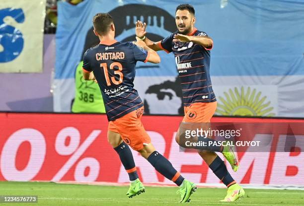 Montpellier's French forward Gaetan Laborde reacts after scoring a goal during the French L1 football match between Montpellier and Marseille at the...
