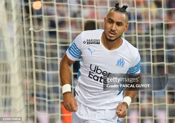 Marseille's French midfielder Dimitri Payet reacts during the French L1 football match between Montpellier and Marseille at the Mosson stadium in...
