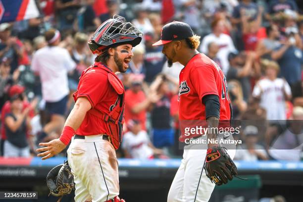 Austin Hedges of the Cleveland Indians and Emmanuel Clase of the Cleveland Indians celebrate after defeating the Detroit Tigers at Progressive Field...