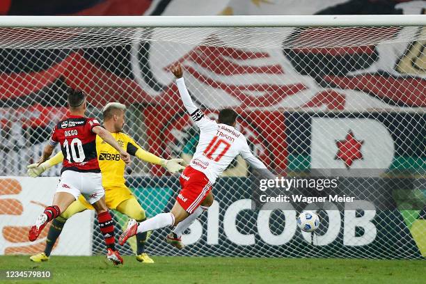 Taison of Internacional scores the third goal of his team during a match between Flamengo and Internacional as part of Brasileirao 2021 at Maracana...