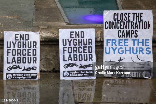 Uyghur Solidarity Campaign UK placards are pictured at a protest opposite the Chinese embassy in support of the Uyghur peoples struggle for freedom...
