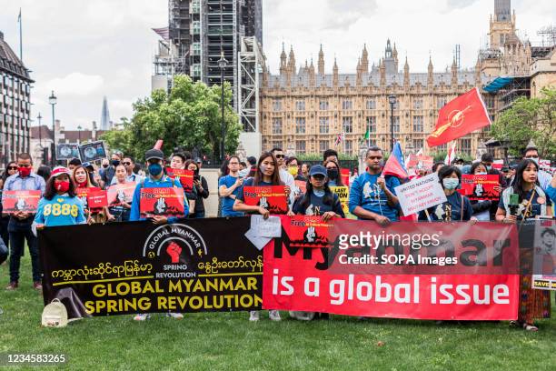 Protestors hold banners during the demonstration. On 8th August 1988, students led what is now known as the 8888 Uprising in Myanmar's capital. They...