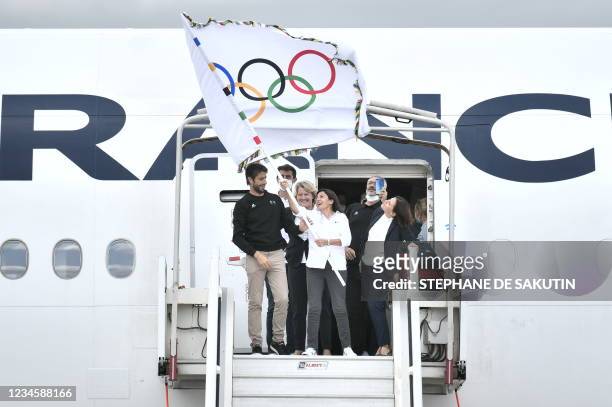 President of French National Olympic Committee Brigitte Henriques and French Delegate Minister of Sports Roxana Maracineanu watch as President of the...