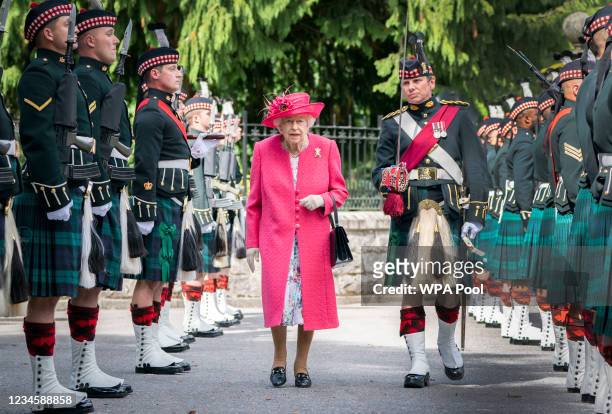 Queen Elizabeth II during an inspection of the Balaklava Company, 5 Battalion The Royal Regiment of Scotland at the gates at Balmoral, as she takes...