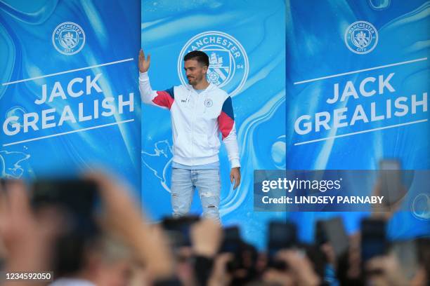 Jack Grealish is presented to Manchester City fans outside the Etihad Stadium after signing for the club in Manchester, north-west England on August...