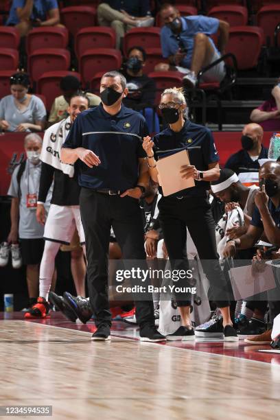 Mike Weinar of the Indiana Pacers talks to Assistant Coach Jenny Boucek of the Indiana Pacers during the 2021 Las Vegas Summer League on August 9,...