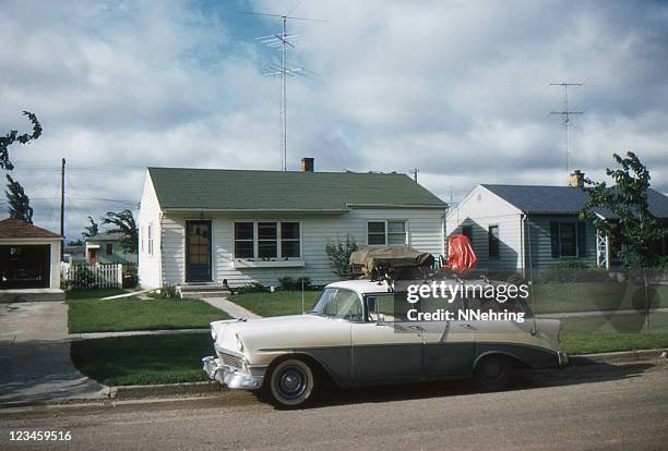 1956 chevrolet parked in front of 50's home - vintage car bildbanksfoton och bilder