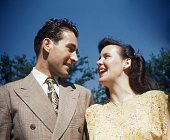 fashionable young couple looking at each other 1948, retro