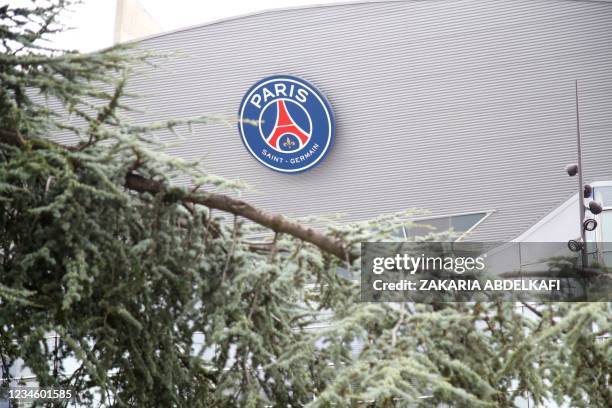 Picture taken outside French football club Paris Saint-Germain's Parc des Princes stadium in Paris on August 10 shows the logo of French football...