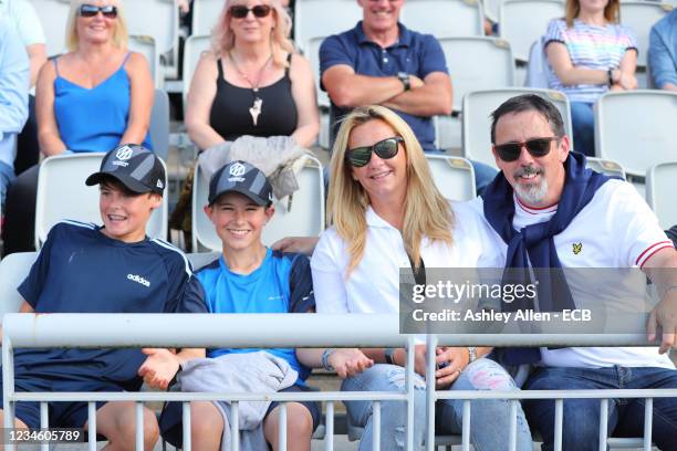 Family enjoy the action during The Hundred match between Manchester Originals Women and London Spirit Women at Emirates Old Trafford on August 10,...