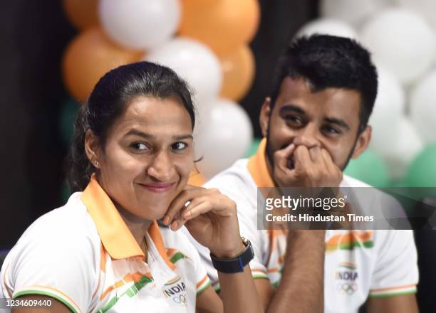 Rani Rampal, captain of the Indian women's hockey team with India men's hockey captain Manpreet Singh during an interaction with the media at Ashoka...