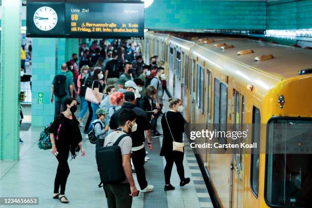 Commuters crowd onto an U-Bahn subway during a railway strike which has affected the local commuter train system as well as intercity travel on...