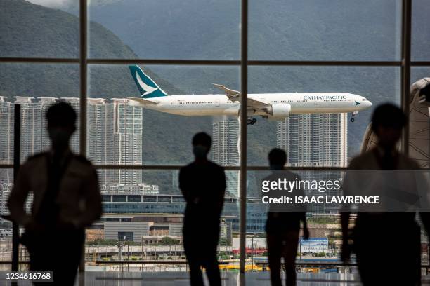 Cathay Pacific aircraft comes in to land at Hong Kong International Airport on August 11, 2021.