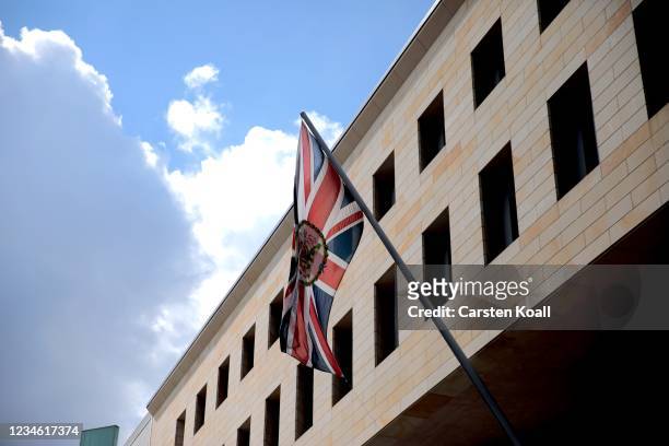 The british national flag waves outside the British Embassy on August 11, 2021 in Berlin, Germany. German law enforcement authorities announced today...