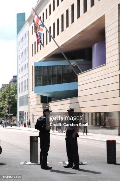 Policemen stands outside the British Embassy on August 11, 2021 in Berlin, Germany. German law enforcement authorities announced today that they have...