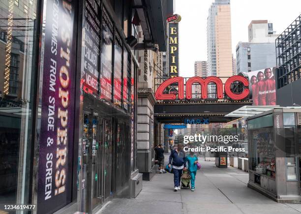 View of AMC movie theater in Times Square whose parent company AMC Entertainment announced accepting Bitcoins as payment by the end of 2021. AMC...