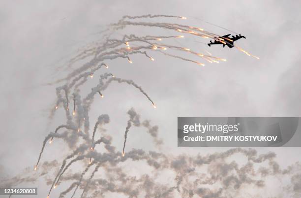 Russian Yak-130 fighter jet shoots flares while perfoming a trick during the MAKS 2009 international aerospace show outside Moscow in Zhukovsky on...