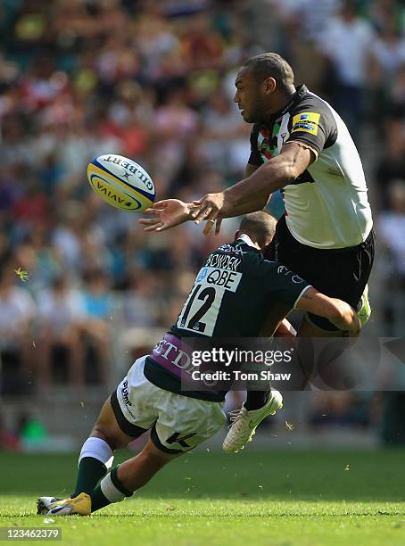 Jordan Turner Hall of Quins is tackled by Dan Bowden of London Irish during the AVIVA Premiership match betrween London Irish and Harlequins at...