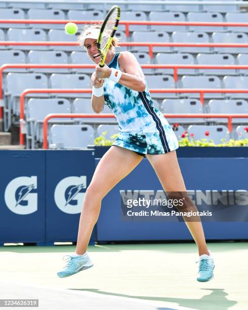 Johanna Konta of Great Britain hits a return during her Women's Singles second round match against Elina Svitolina of Ukraine on Day Three of the...
