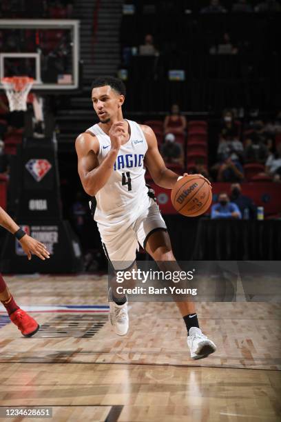 Jalen Suggs of the Orlando Magic dribbles the ball against the Cleveland Cavaliers during the 2021 Las Vegas Summer League on August 11, 2021 at the...