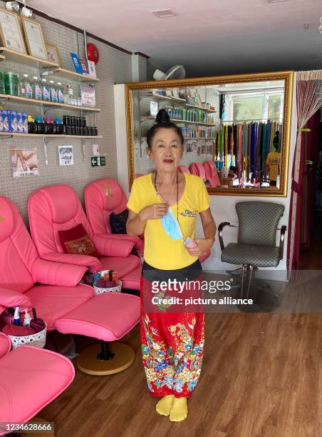 July 2021, Thailand, Patong: Pip, who runs a massage parlour on Patong's famous Bangla Road, has hardly any customers since Corona. On July 1,...