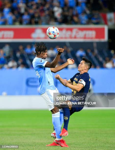 S defender Tayvon Gray vies for the ball with Pumas' defender Efrain Velarde during the 2021 Leagues Cup Quarterfinals match between New York City FC...