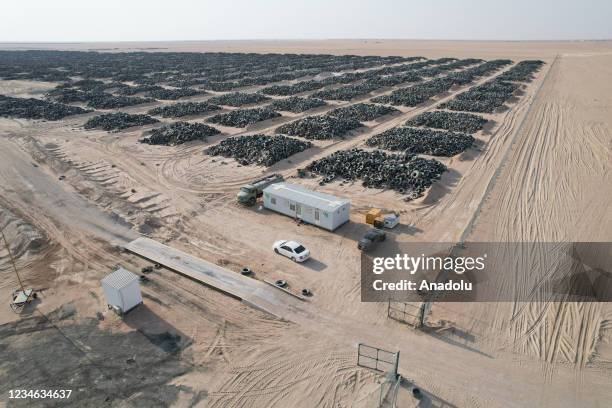 An aerial view of the tyre graveyard where disposed tyres stored as the landfill threatens the environment and human health due to containing...