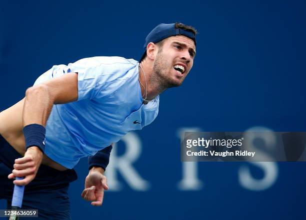 Karen Khachanov of Russia serves against Stefanos Tsitsipas of Greece during the third round on Day Four of the National Bank Open at Aviva Centre on...