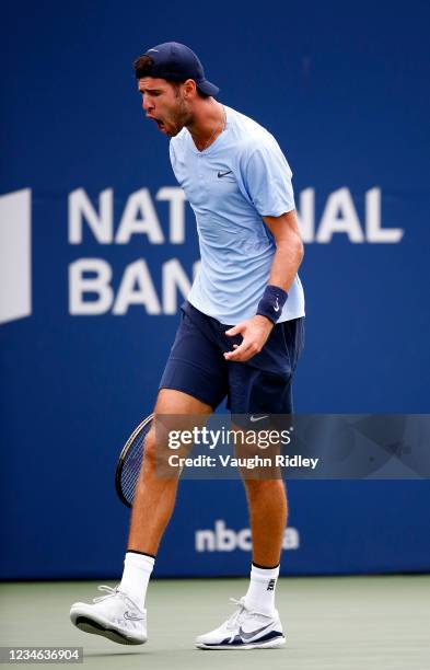 Karen Khachanov of Russia reacts after losing a point against Stefanos Tsitsipas of Greece during the third round on Day Four of the National Bank...