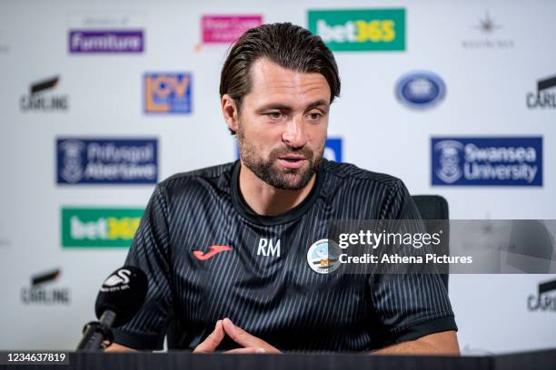 Russell Martin Head Coach of Swansea City speaks during the Swansea City Press Conference at The Fairwood Training Ground on August 12, 2021 in...