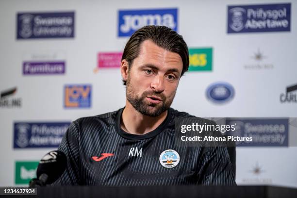 Russell Martin Head Coach of Swansea City speaks during the Swansea City Press Conference at The Fairwood Training Ground on August 12, 2021 in...