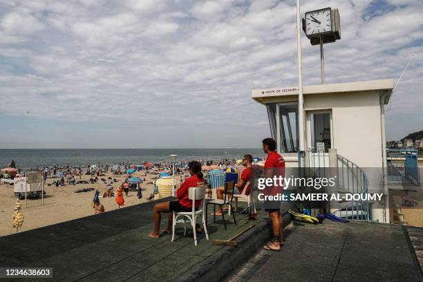 Lifeguards watches the beach in Trouville-sur-Mer on August 12, 2021.