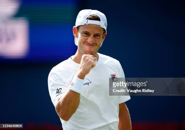 Diego Schwartzman of Argentina celebrates after winning a point against Roberto Bautista Agut of Spain during the third round on Day Four of the...