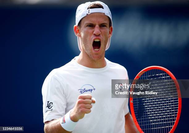 Diego Schwartzman of Argentina celebrates after winning a point against Roberto Bautista Agut of Spain during the third round on Day Four of the...