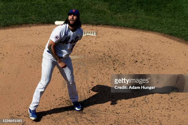 Trevor Williams of the New York Mets looks at a foul ball during the third inning against the Washington Nationals in game two of a doubleheader at...