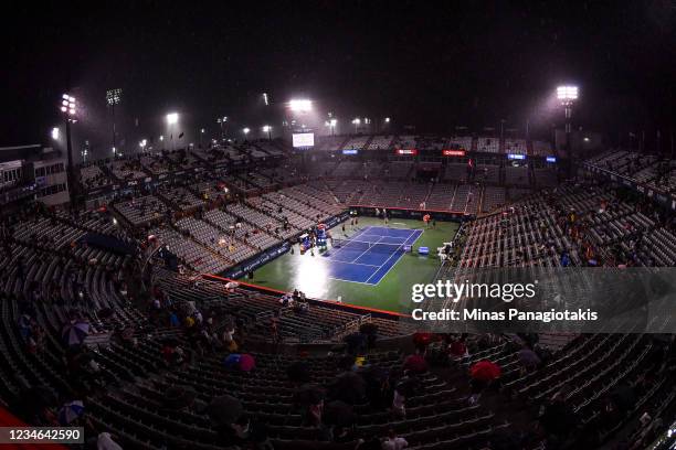 General view of inside the stadium during a rain delay during the Women's Singles third round match between Bianca Andreescu of Canada and Ons Jabeur...