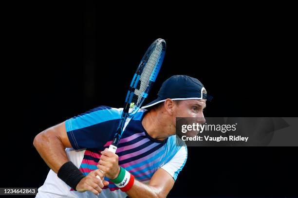 James Duckworth of Australia hits a shot against Daniil Medvedev of Russia during the third round on Day Four of the National Bank Open at Aviva...