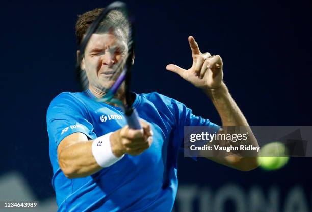 Hubert Hurkacz of Poland hits a shot against Nikoloz Basilashvili of Georgia during the third round on Day Four of the National Bank Open at Aviva...