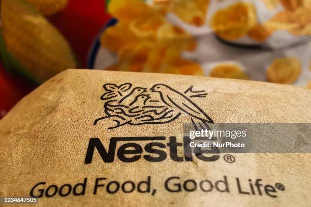 Nestle logo is seen on a breakfast cereal packaging in this illustration photo taken in Sulkowice, Poland on August 12, 2021.