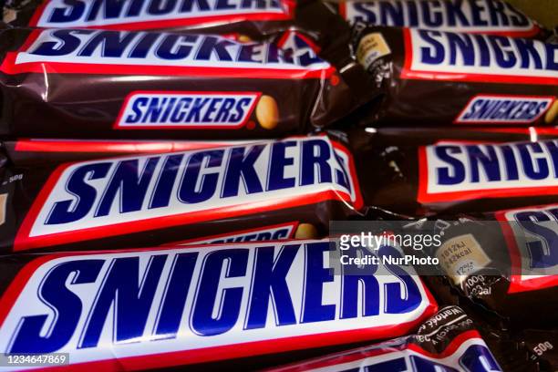Snickers chocolate bars packaging are seen in a shop in Sulkowice, Poland on August 12, 2021.